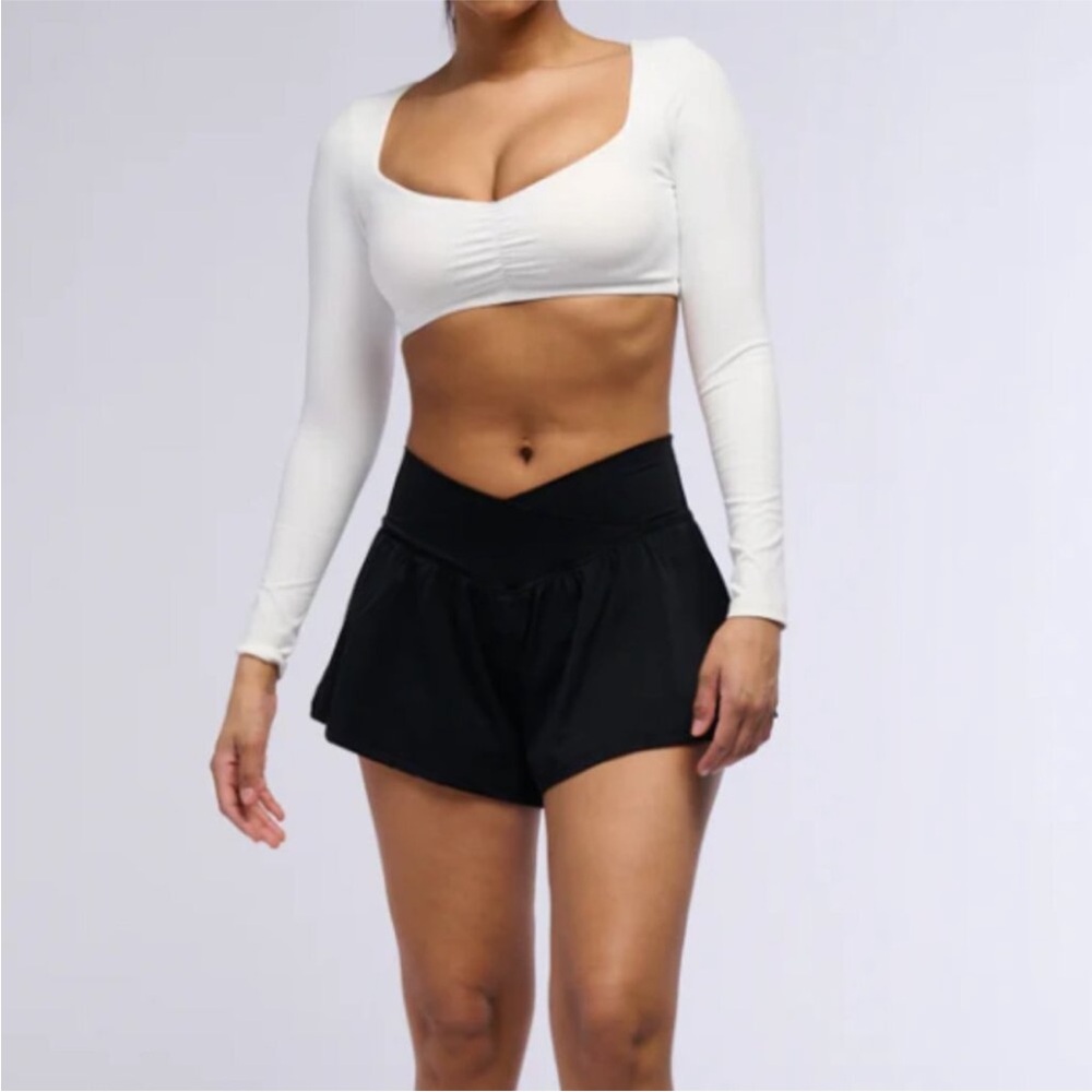 On the Move AKIRA Ruffle Short in Black lg